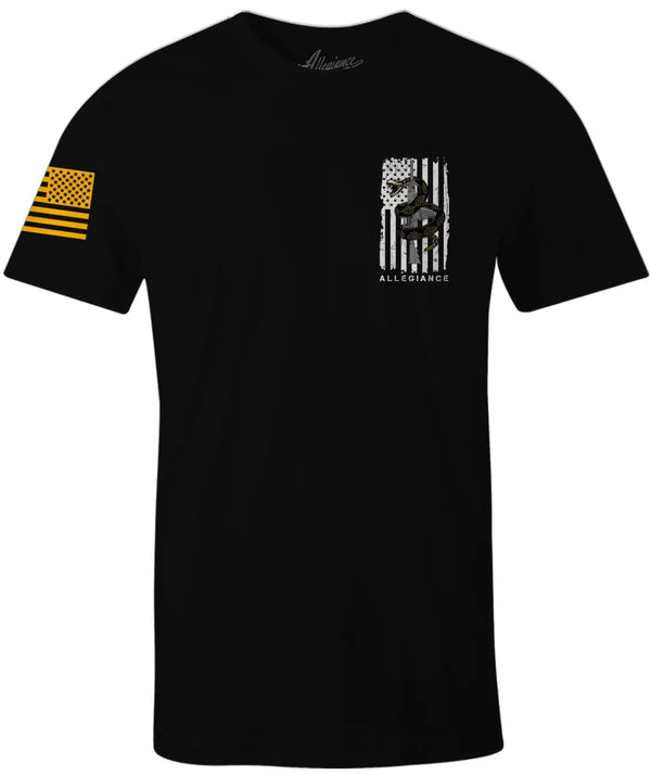 Front of Rattler Tee in black featuring small coiled rattlesnake and rifle chest graphic with American flag sleeve print.